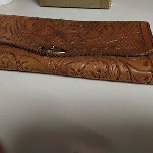 selling an engraved leather purse